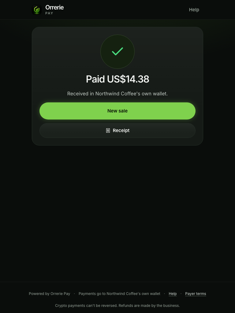 The till's full screen after the network confirmed the payment: Paid US$14.38 with a tick, New sale and Receipt.