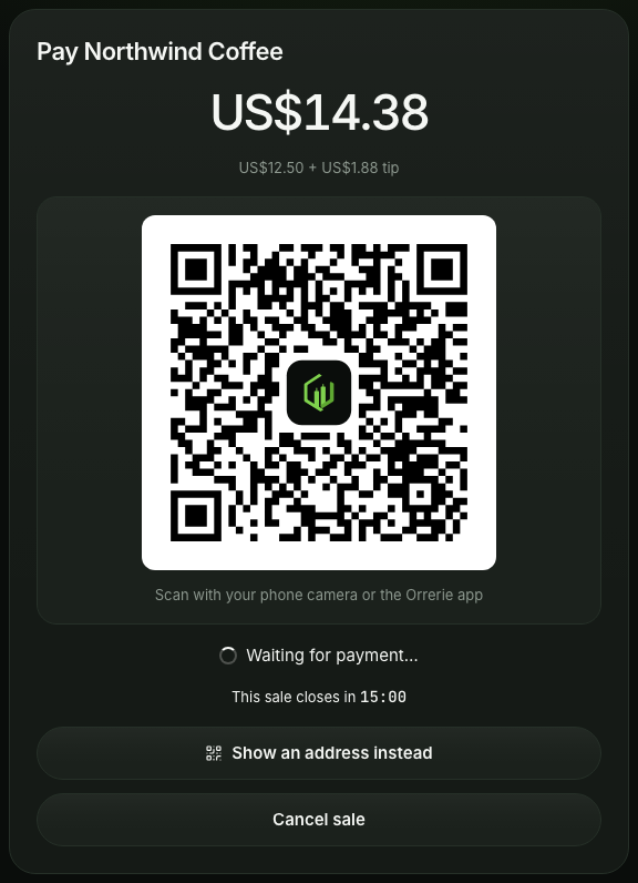 The till showing US$14.38 (US$12.50 and a 15% tip) and a large QR code, Scan with your phone camera or the Orrerie app, and Waiting for payment.